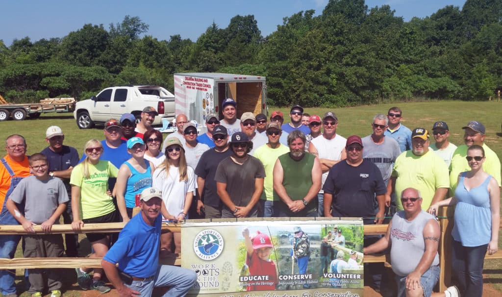 Thirty-eight union volunteers came together through USA's Work Boots on the Ground program to dress up and add security at Lake Thunderbird State Park.