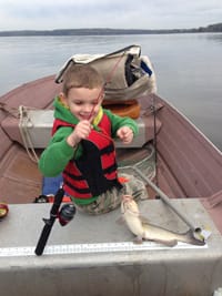 Cale W. Fuller, Jr. catches his first catfish - his favorite fish.