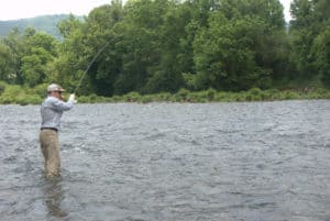 While classic drift boats are common on the Watauga, wet wading can also be an effective way to fly fish.
