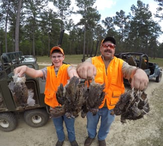 Dave Cole of UWUA Local 666 and his son, Tristan, on a Brotherhood Outdoors quail hunt.