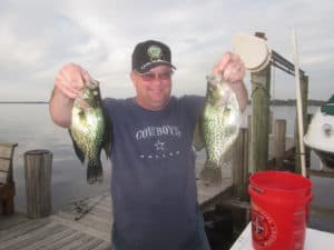 Crappie fishing is notoriously good around docks, especially ones having brush piles and abundant cross supports.