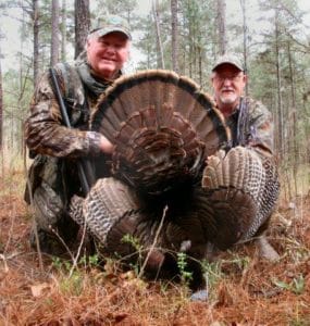 World Champion caller Preston Pittman (right) called in this heavyweight eastern tom for author Bob McNally. The bird was hung-up for more than two hours.