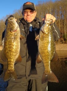 Smallmouth bass grow huge on Mid-South reservoirs like Wilson, Pickwick and Tim's Ford. Here, guide Jake Davis shows off a pair of 4 1/2-pound bronze beauties.