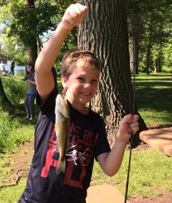 One youth shows off his nice catch in Eau Claire.