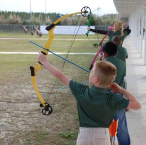 A new, permanent roof, built by union volunteers provides shelter at the archery range for kids at J.W Corbett Wildlife Management Area’s Everglades Youth Conservation Camp.