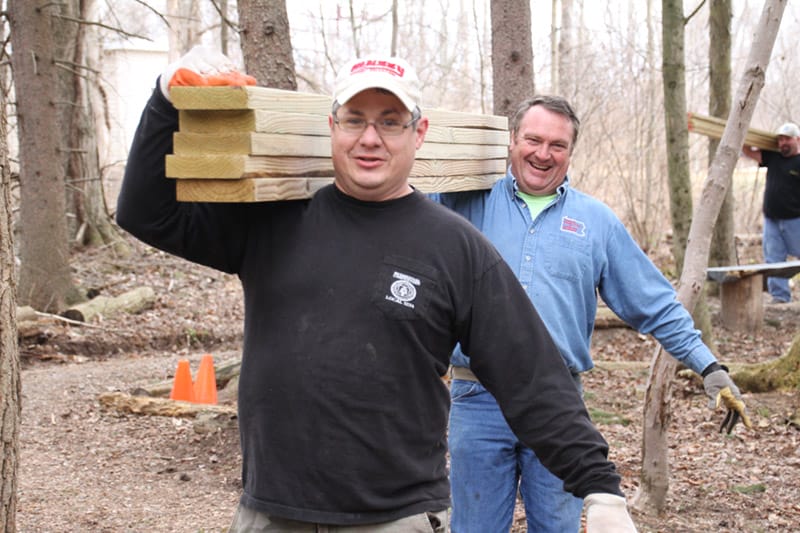 Union workers and members of the community volunteered expert skills, time and talents to rebuild a walking bridge at Ned Smith Center for Nature & Art.