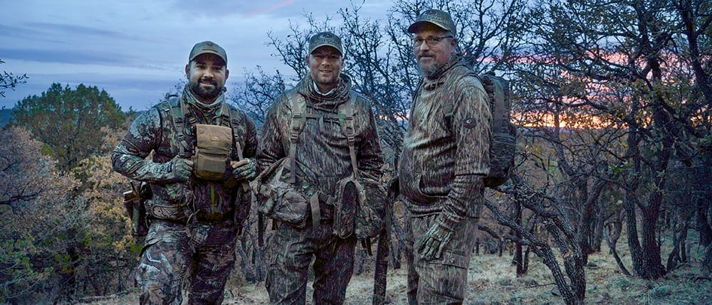 image: 3 men turkey hunting