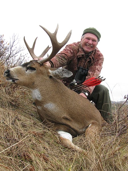 image: Chuck Adams with Sitka deer