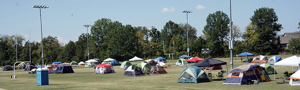 image: tents in a football field