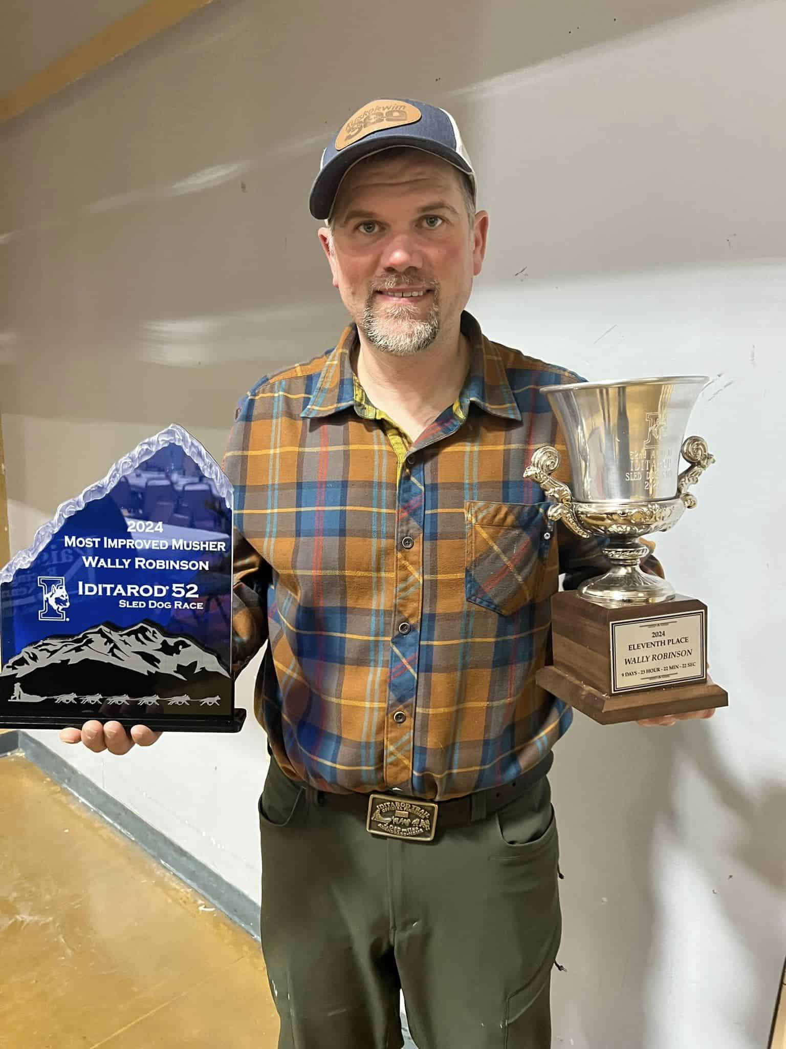 image: Wally Robinson with 2024 Iditarod awards