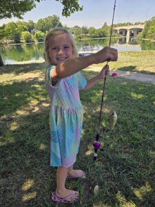 Girl fishing at Dayton Take Kids Fishing Day