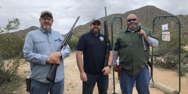 Kyle, Jacob and Larry Evenson prepare to shoot at the Arizona BCTC Sporting Clays Shoot.