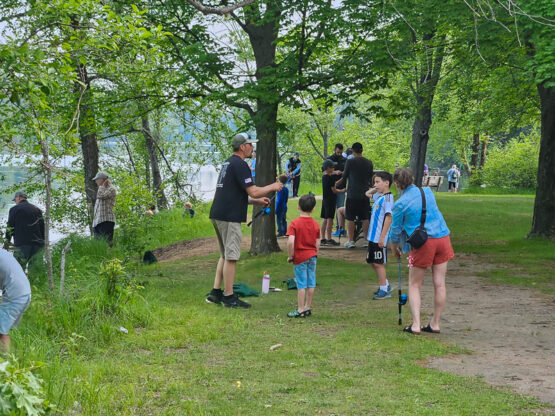 Union volunteers, parents and youths at Eau Claire Take Kids Fishing Day