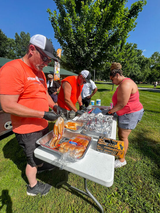 Take Kids Fishing Day volunteers prepare lunch