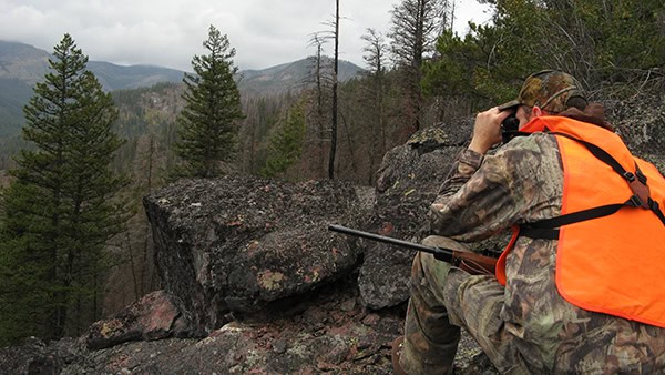 image: hunt glassing western landscape