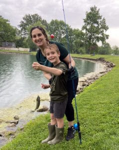 image: woman and boy fishing
