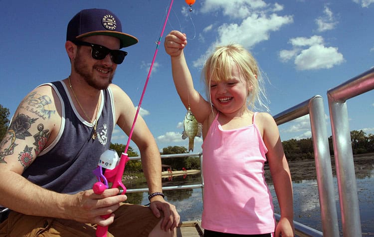 image: girl's first fish