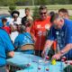 Union volunteers setting up fishing poles.
