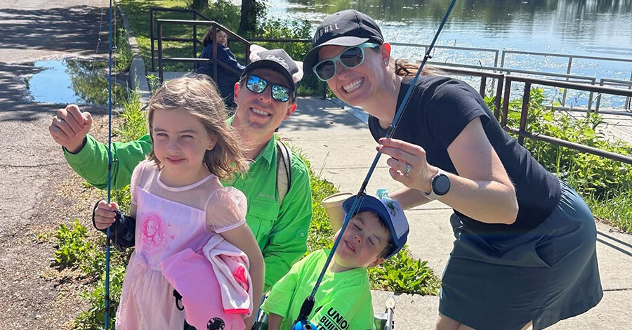 Family with fishing rods