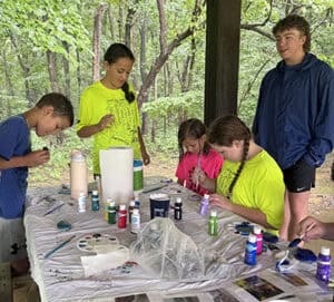 image: kids doing nature art